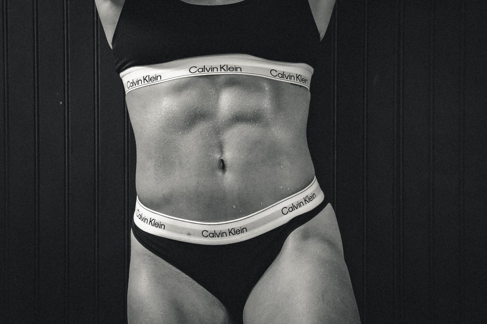 High-contrast black and white core study, lit to pick out the lines