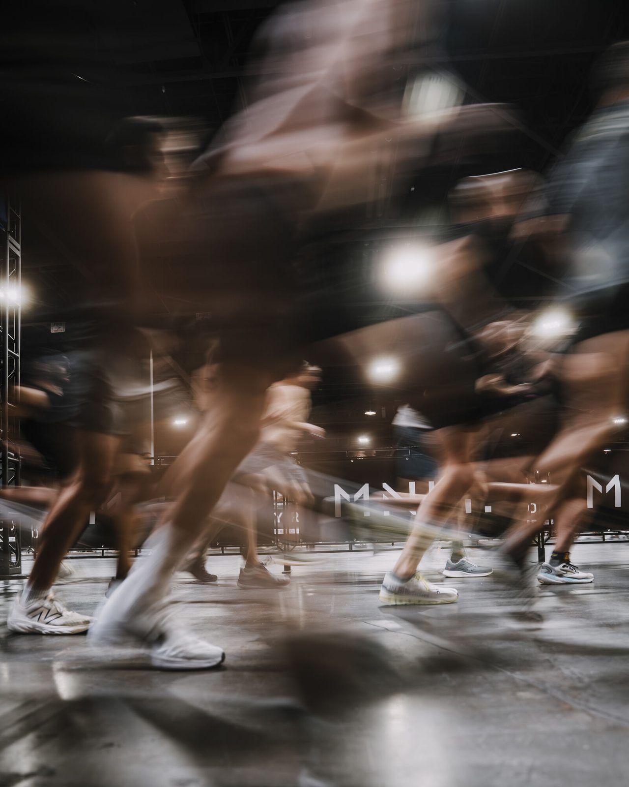 Athletes moving through the HYROX floor